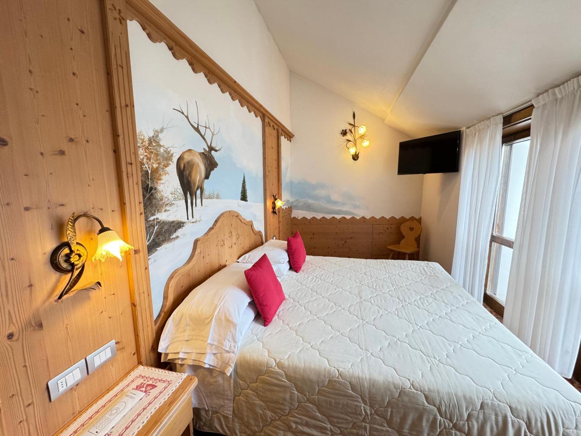 Hotel Europa San Martino Di Castrozza Rum bild